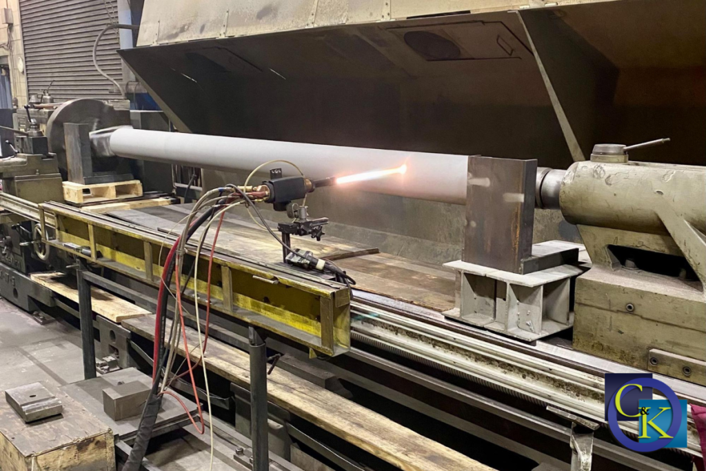 Large machinery with laser from Chalmers & Kubeck; subtractive v. additive manufacturing