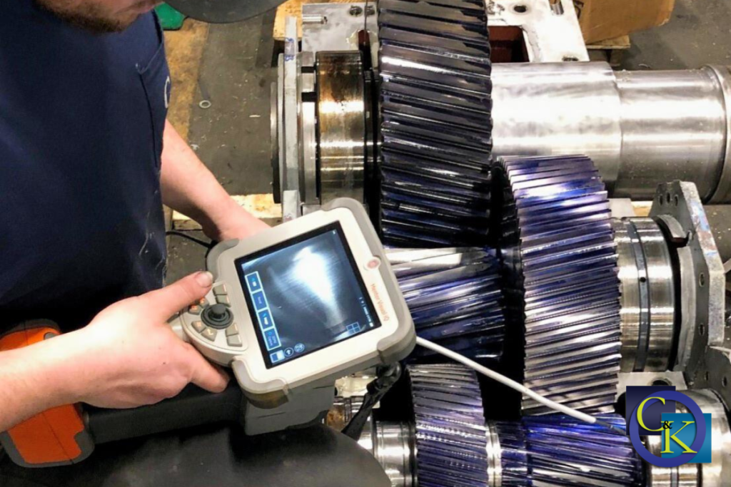 image of Chalmers & Kubeck professionals performing predictive maintenance